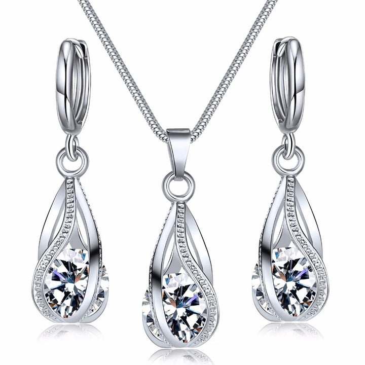 https://ae01.alicdn.com/kf/S388465e61282436d869e602bbd2efa03e/Obega-Cubic-Zirconia-Necklace-Set-Lantern-Design-Multi-Color-Stone-Pendant-Necklace-Drop-Earrings-Copper-Material.jpg