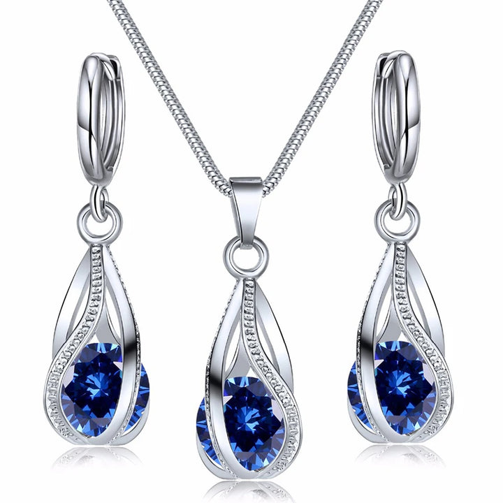 https://ae01.alicdn.com/kf/S15c30f92a2da42c68c5222c71aa6a264i/Obega-Cubic-Zirconia-Necklace-Set-Lantern-Design-Multi-Color-Stone-Pendant-Necklace-Drop-Earrings-Copper-Material.jpg